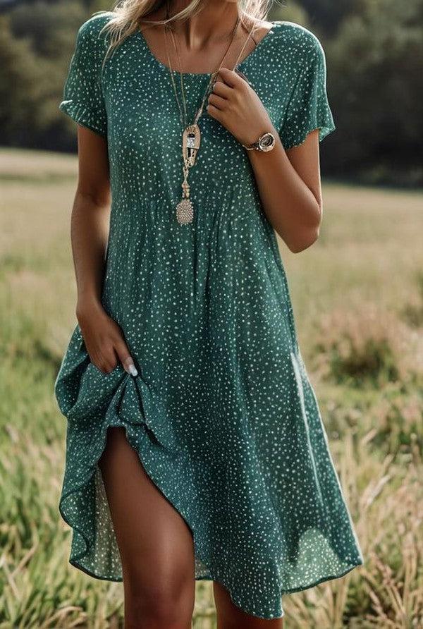 Emily short sleeve green polka dot mini dress