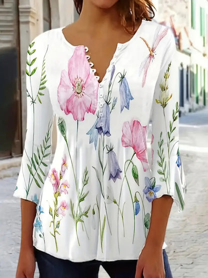 Fiorella – floral print top with buttons and flared sleeves