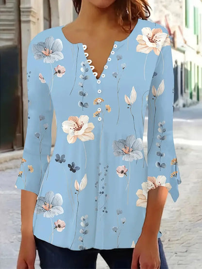 Fiorella – floral print top with buttons and flared sleeves