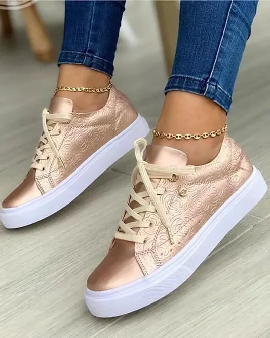 Chic sneakers with gold detail