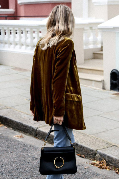 Eye-catching velvet blazer in street style