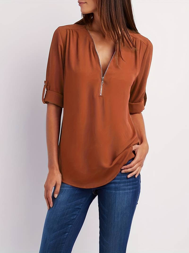 Hazel – casual, ruffled blouse with roll-up sleeves and half zip