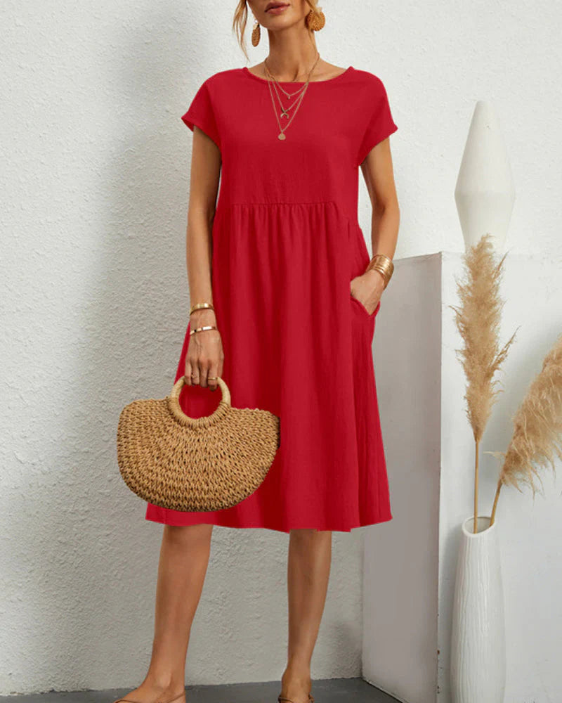 Comfortable midi dress with a round neckline and pockets