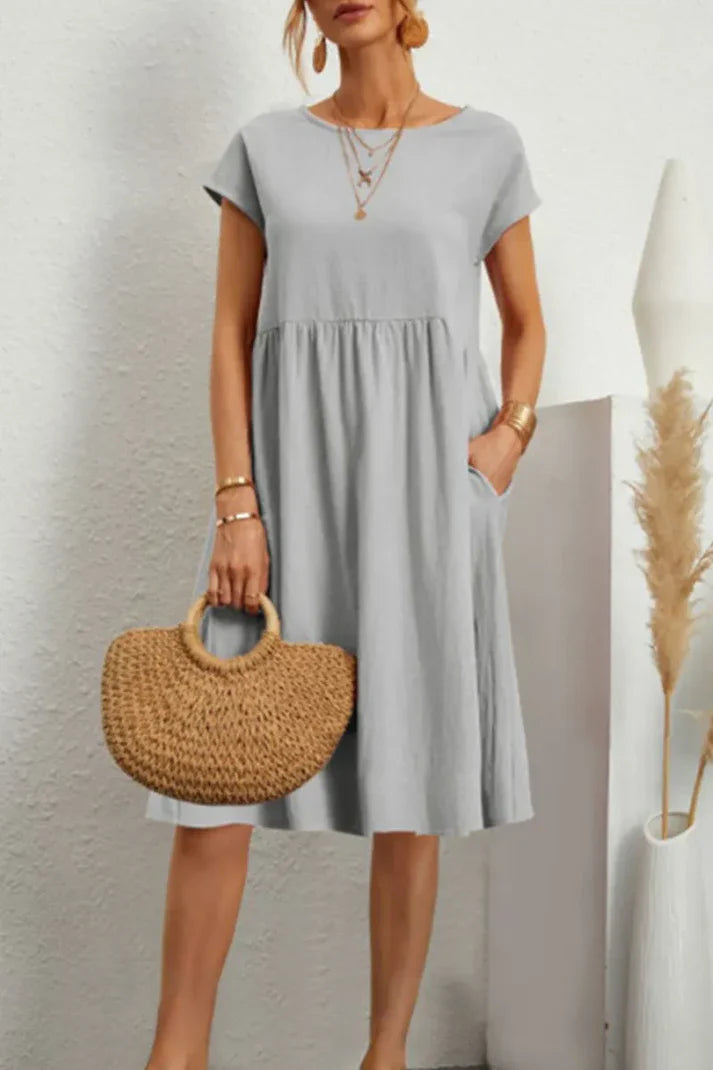 Melanie - plain-colored, casual dress with short sleeves and a round neckline