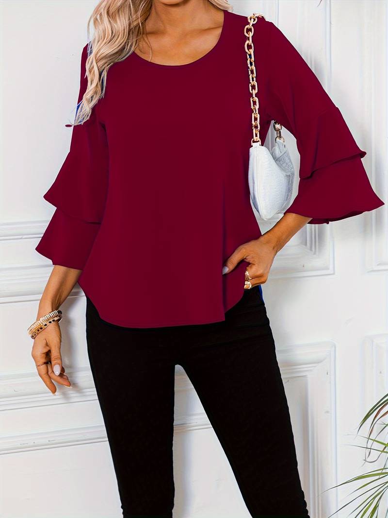 Abigail – blouse with a round neckline and flared sleeves