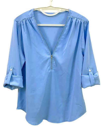 Hazel – casual, ruffled blouse with roll-up sleeves and half zip