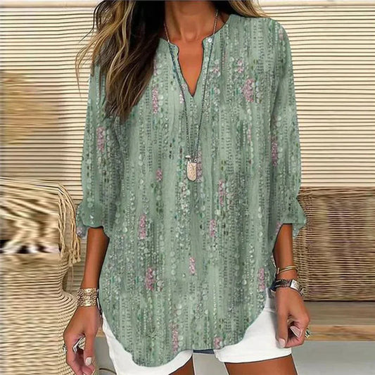 Isabella – blouse with green plant happiness and N-neckline