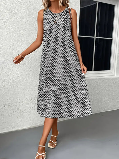 Olivia – midi dress with a round neckline and an all-over print