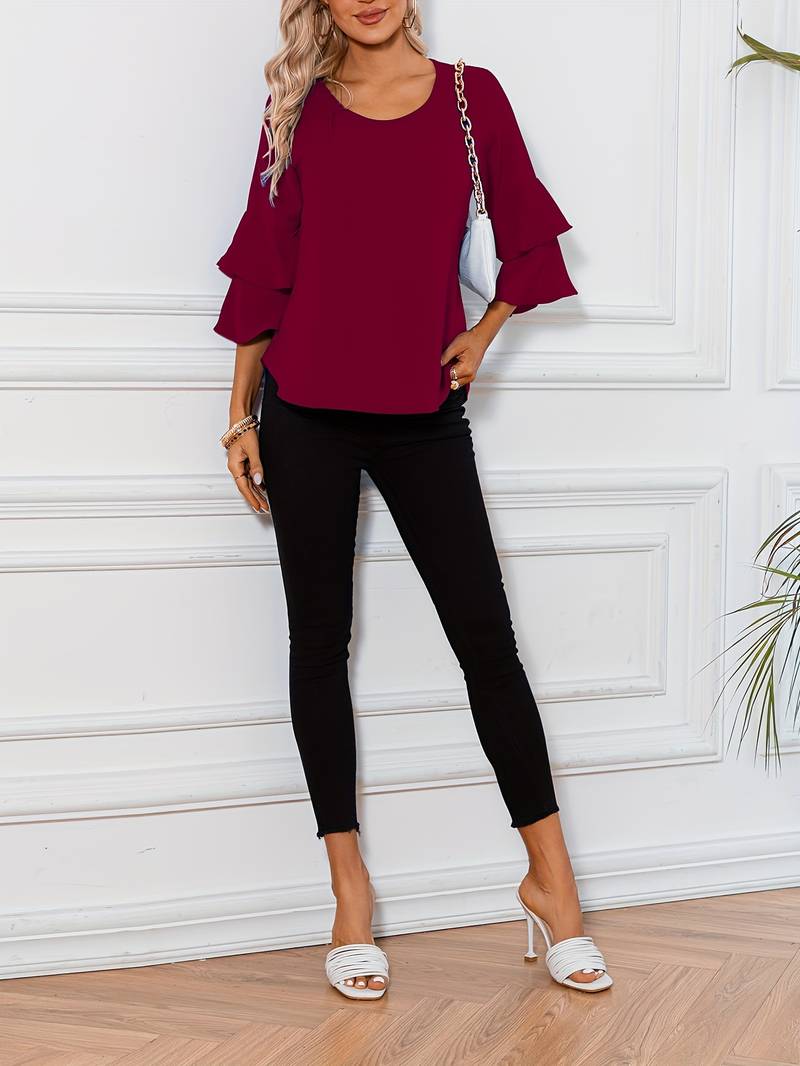 Abigail – blouse with a round neckline and flared sleeves