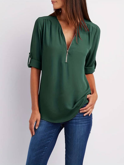 Hazel – casual, ruffled blouse with roll-up sleeves and half zip